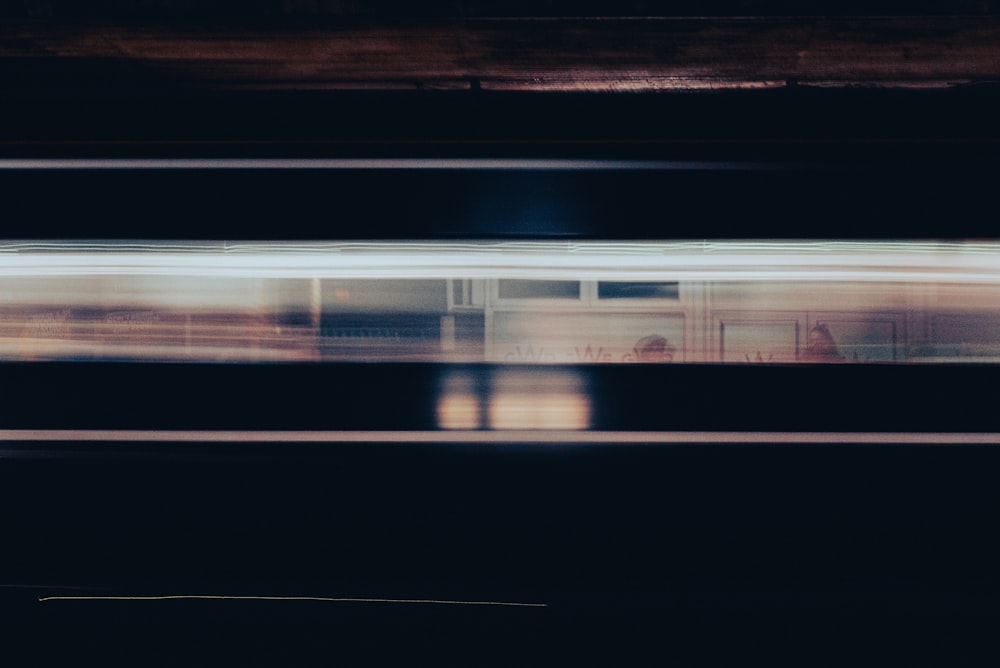 a blurry photo of a train passing by