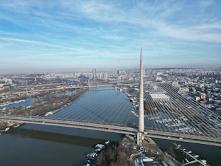 an aerial view of a bridge over a river