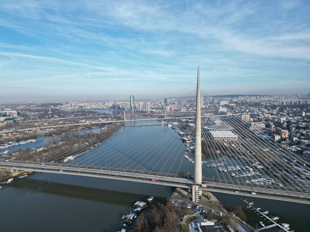 an aerial view of a bridge over a river