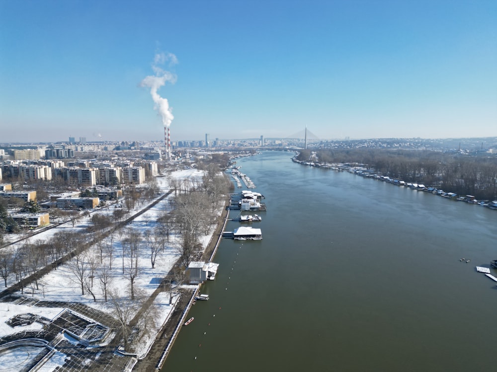 an aerial view of a river and a city