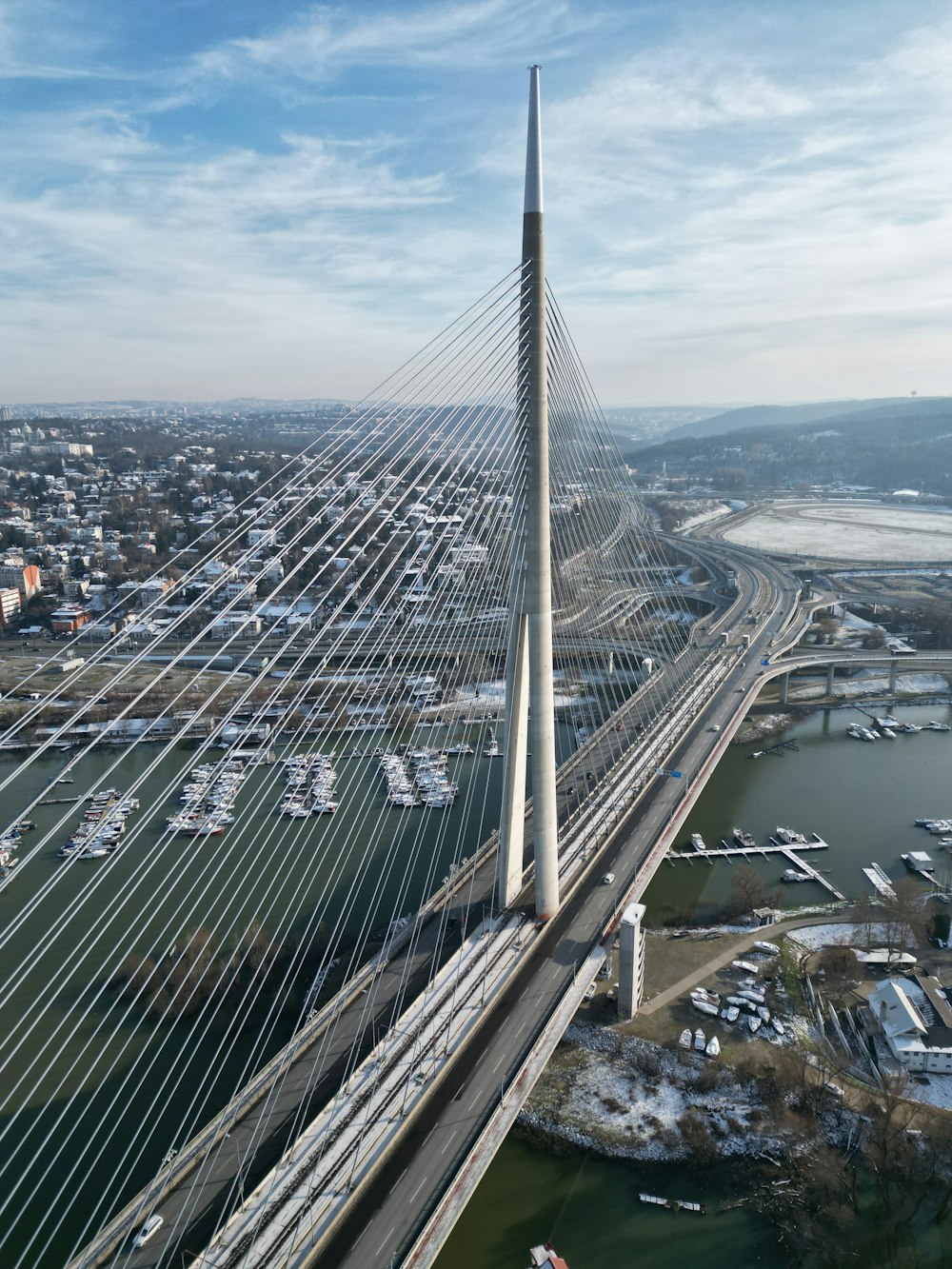 a very tall bridge spanning over a large body of water