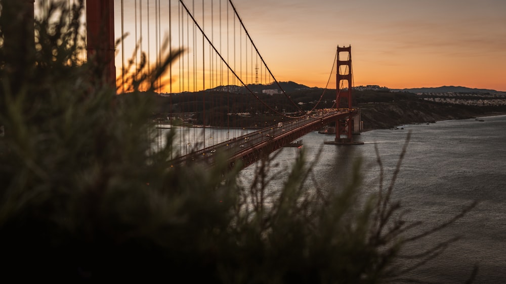 a view of the golden gate bridge at sunset