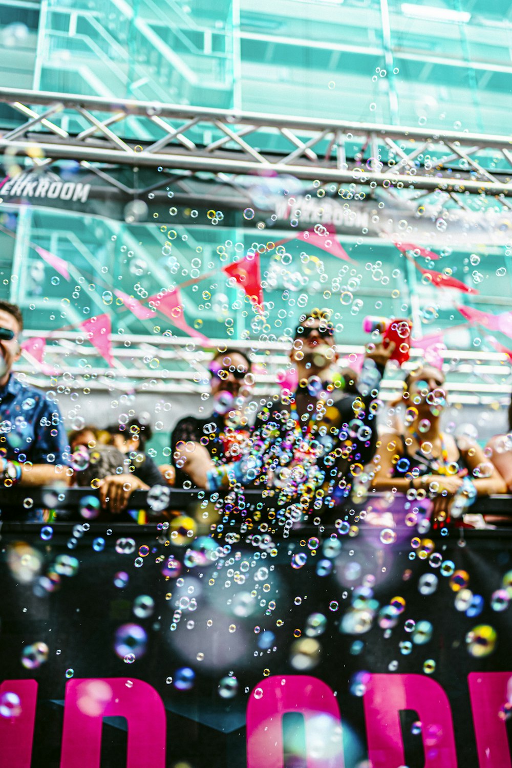 a group of people standing on top of a stage