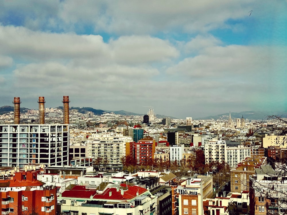 a view of a city with tall buildings