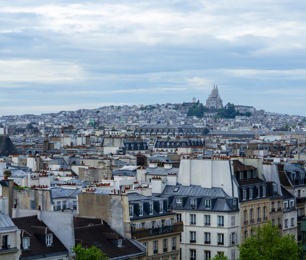 a view of a city from the top of a hill