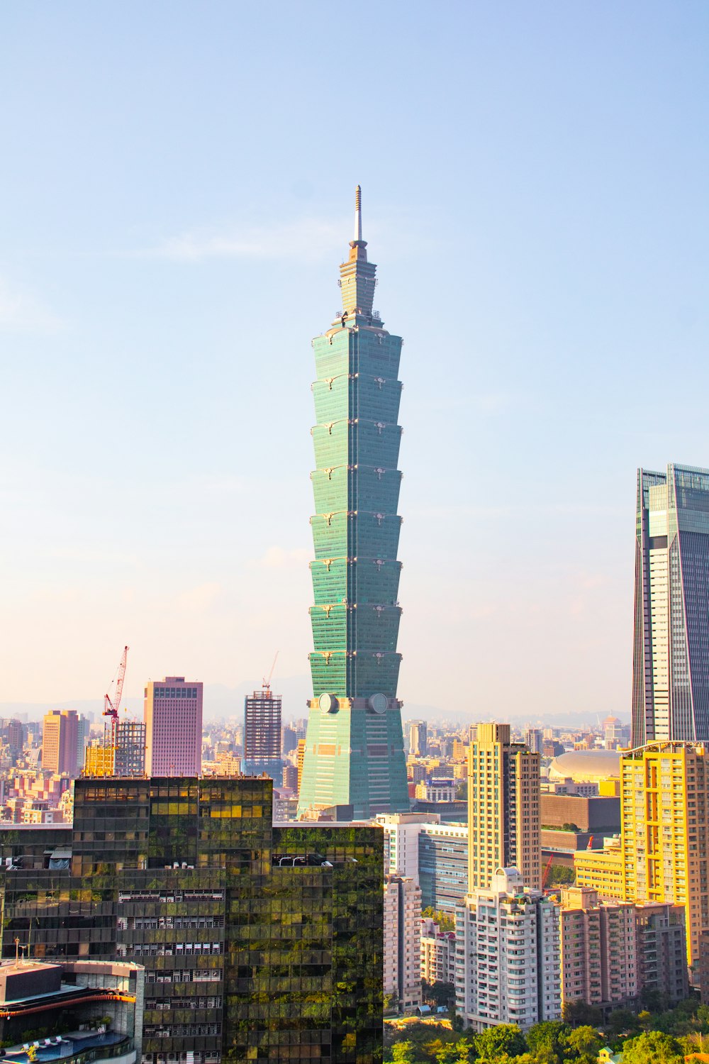 a view of a very tall building in a city