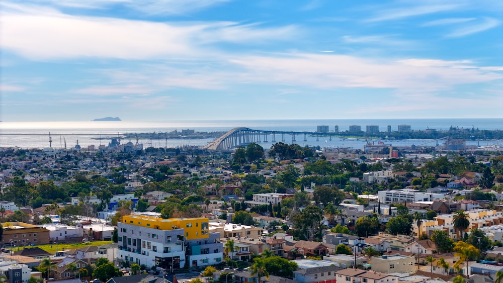 a view of a city with a bridge in the distance