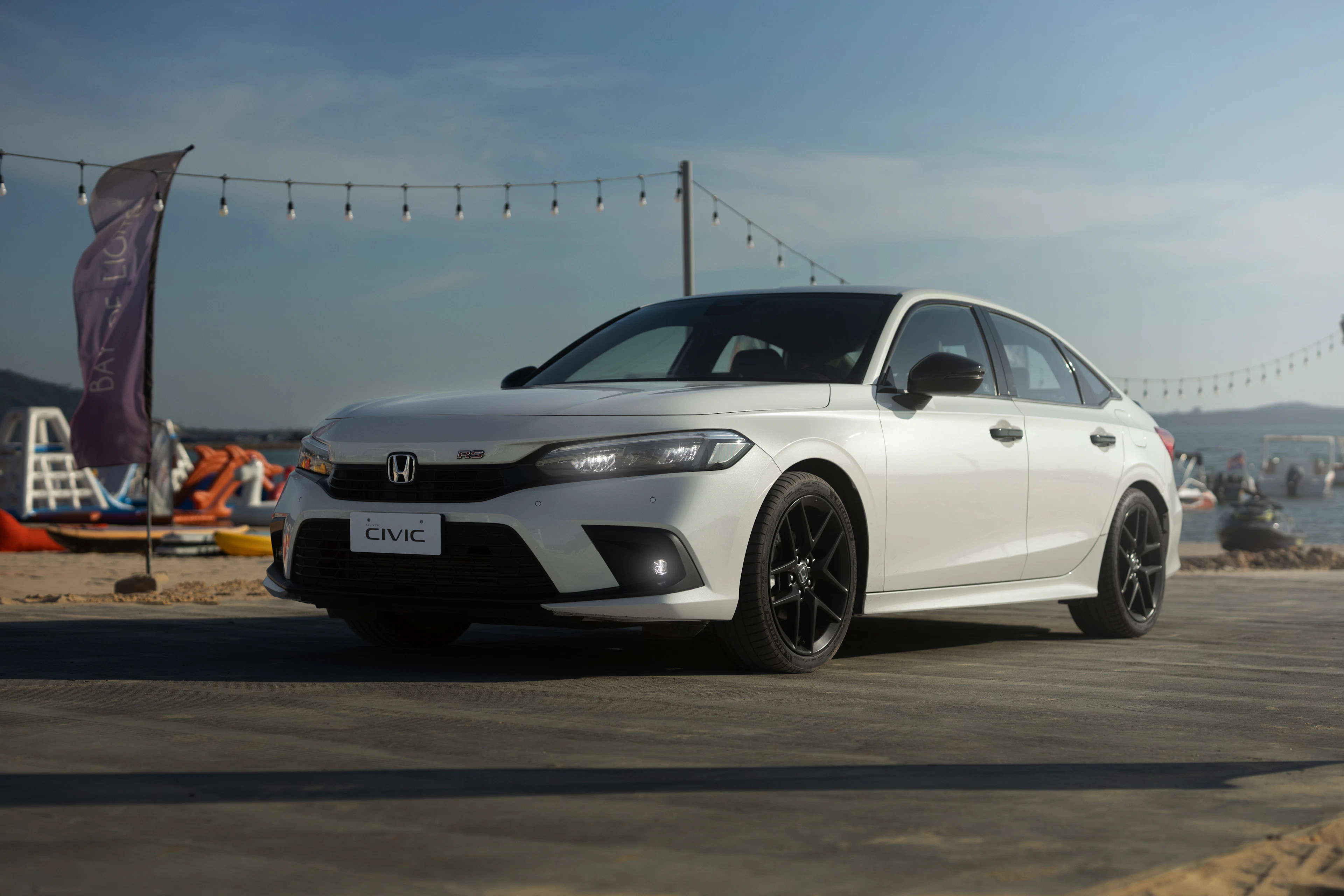 White Honda Civic, front three-quarter view