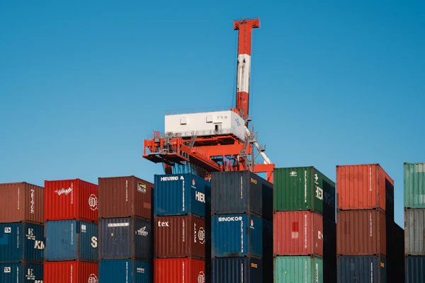 Port crane above a large stack of containers