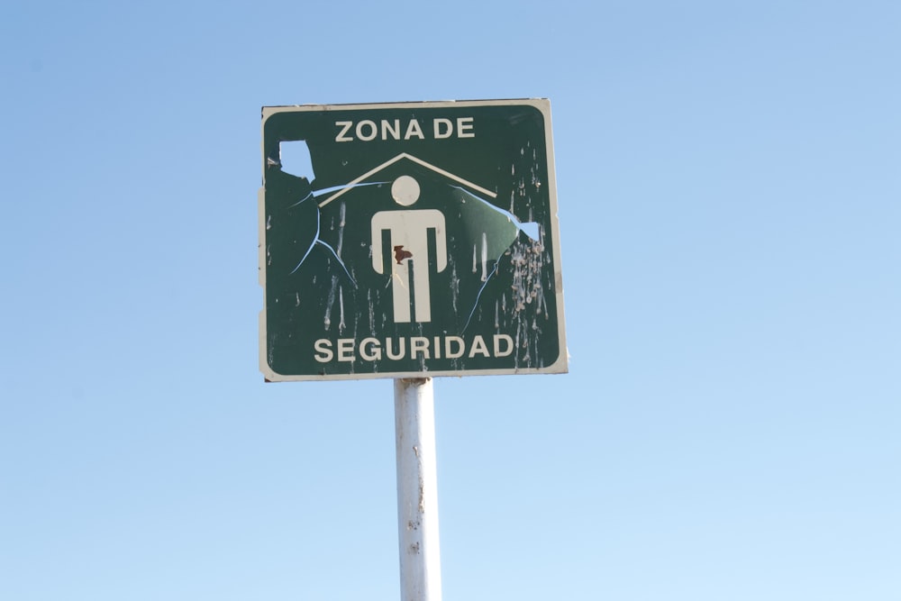 a street sign with a picture of a person on it