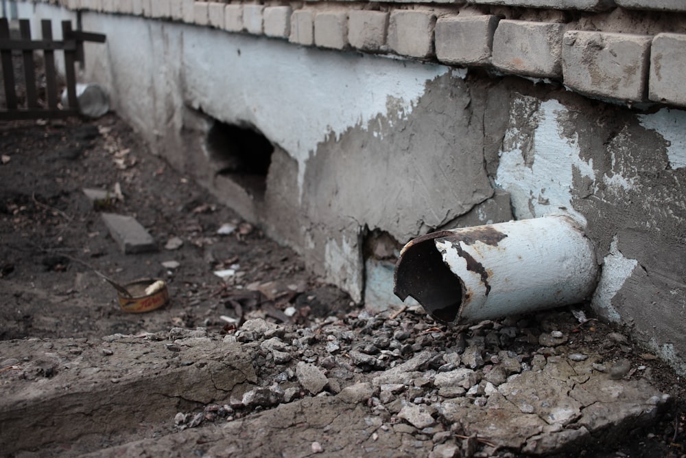 a pipe sticking out of the side of a building