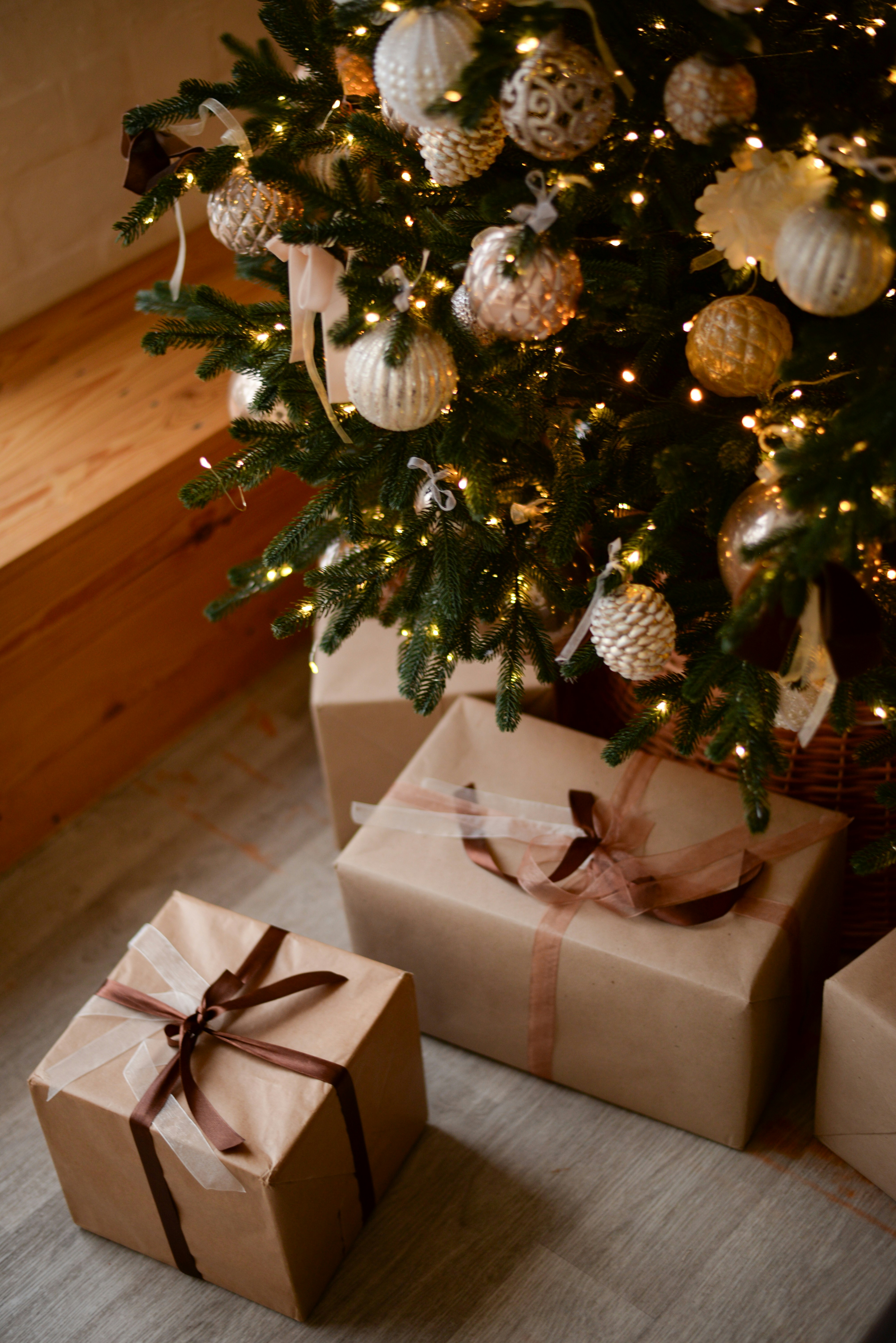 a christmas tree with presents under it- new year resolutions ideas