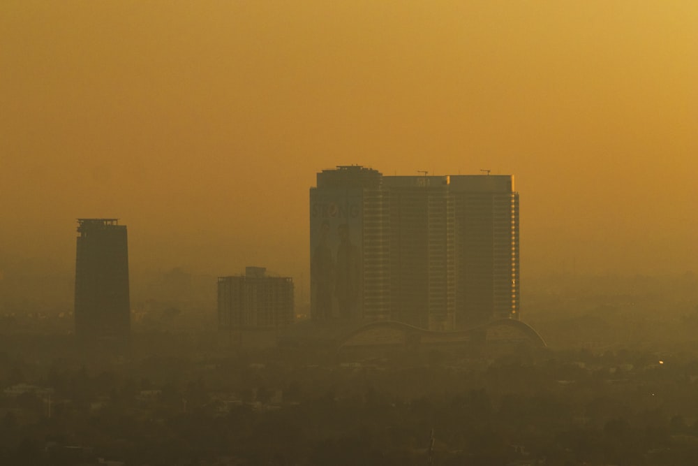 a view of a city with tall buildings in the distance