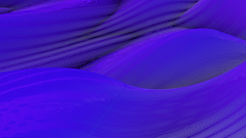 an abstract purple background with wavy lines