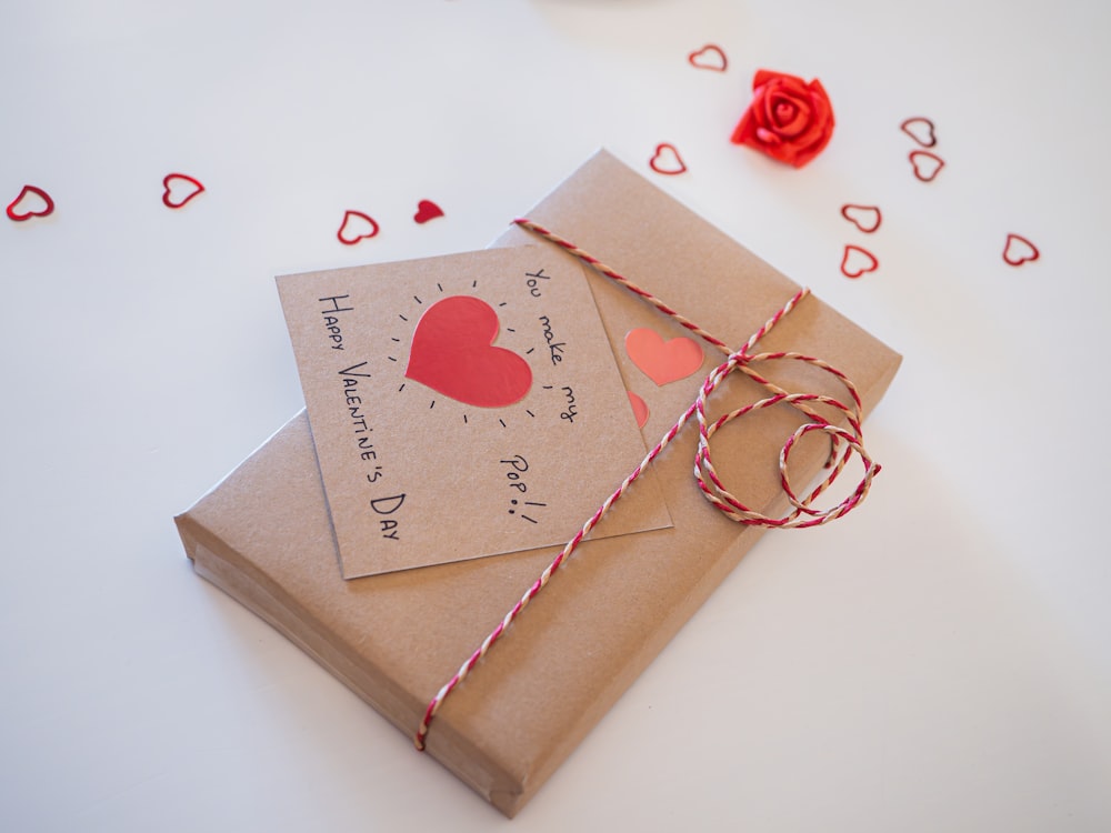 a brown package with a red heart on it