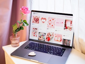 a laptop computer sitting on top of a desk