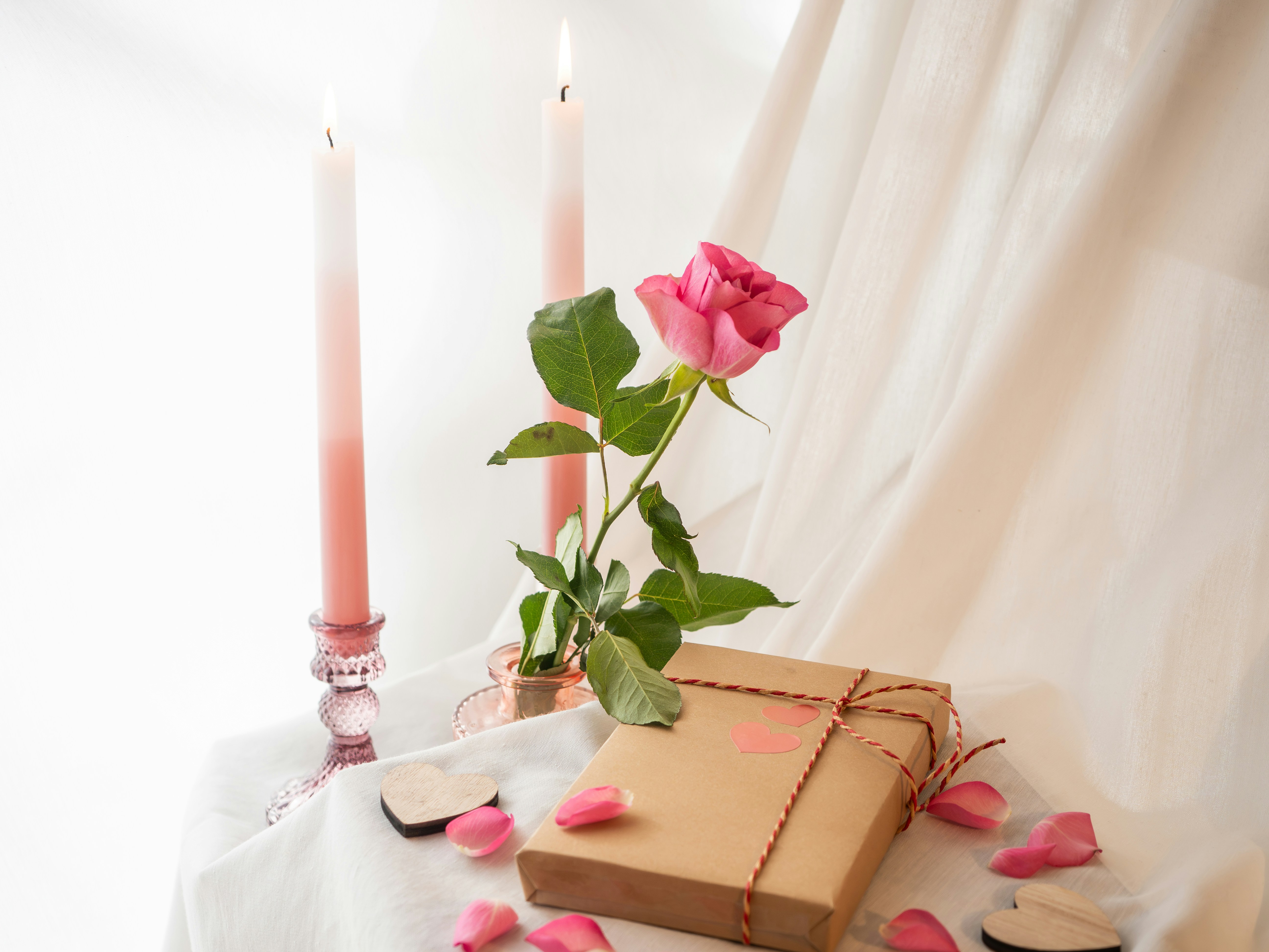Romantic setup with candles and present