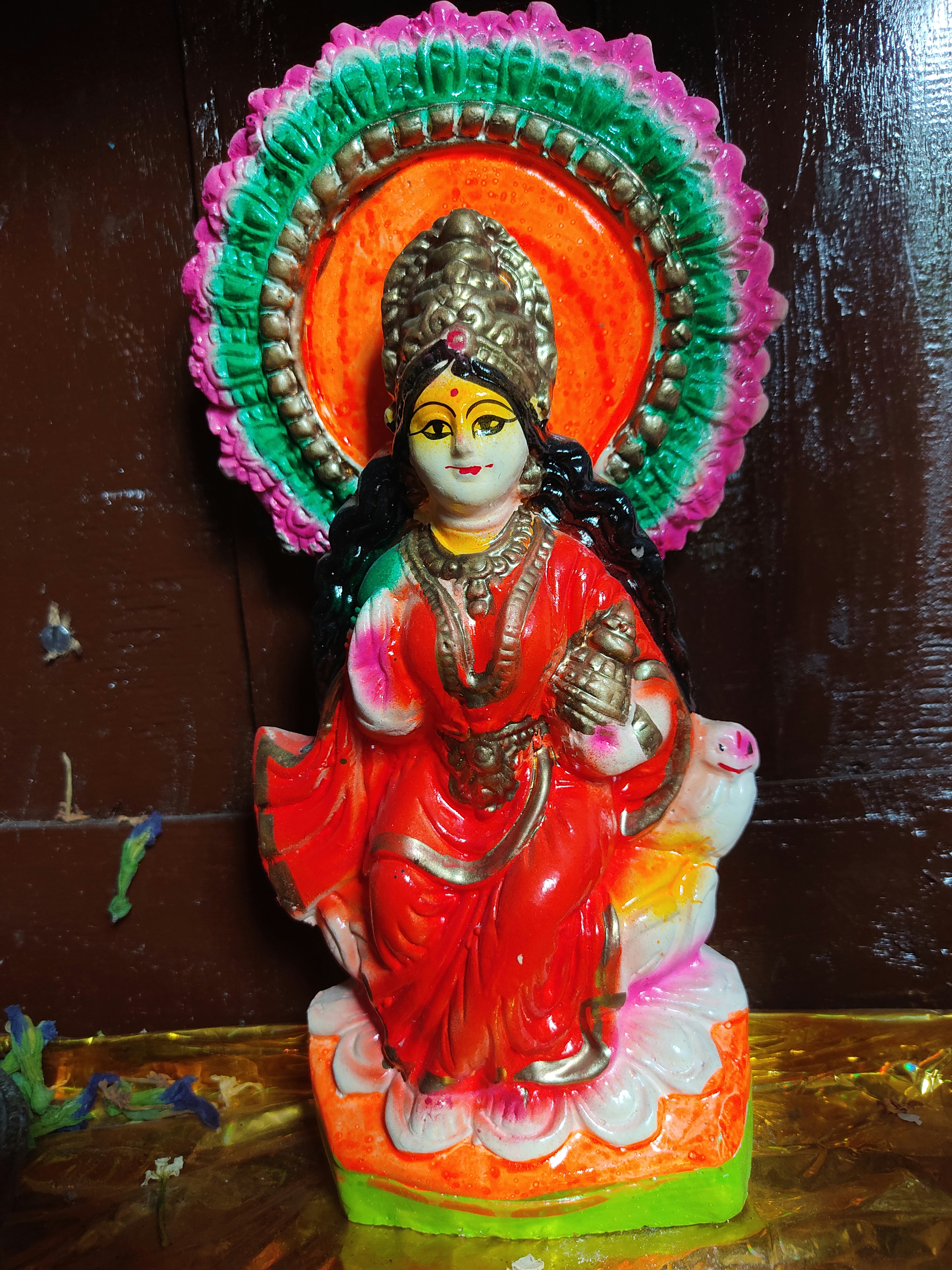 Lakshmi Idol — Seated — Bell Metal artifact, warm studio lighting