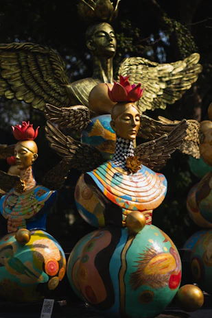 a statue of a woman with a crown on top of it