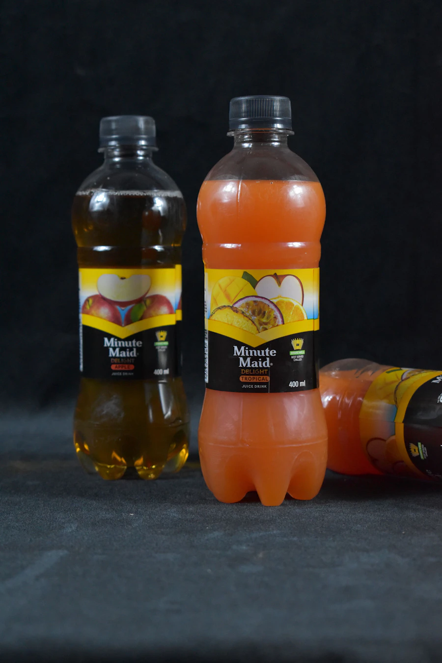 Sleeved juice bottles lined up together