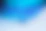a blurry image of a blue and white background