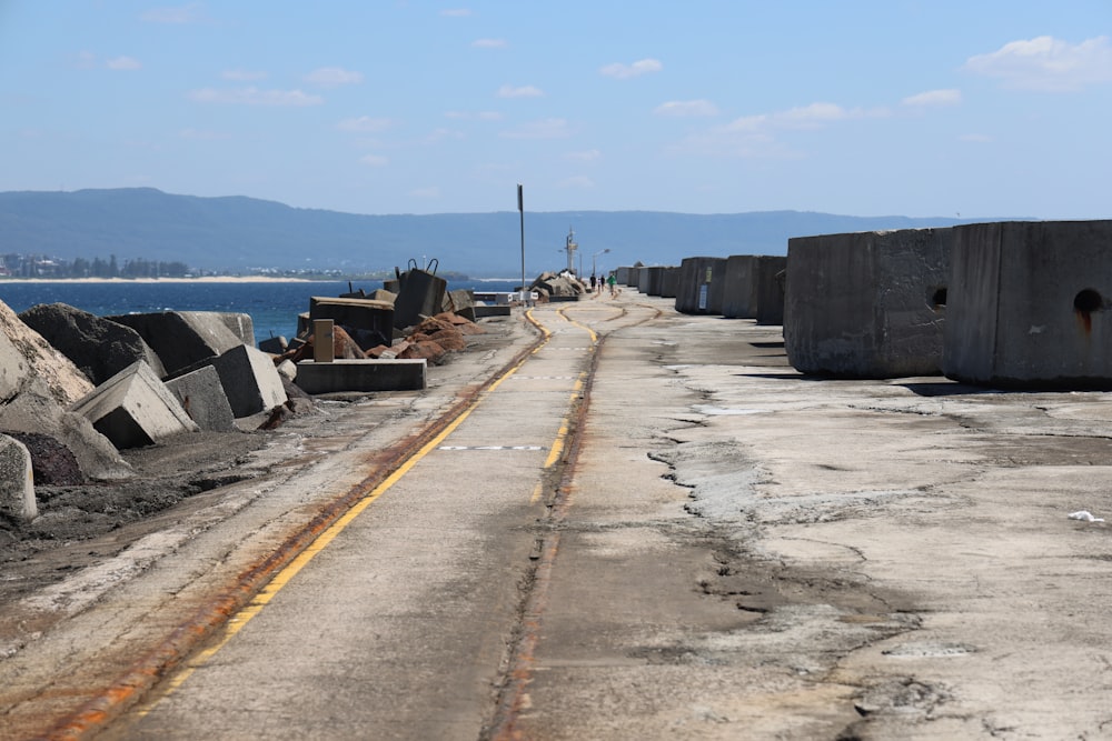 a road that is next to a body of water