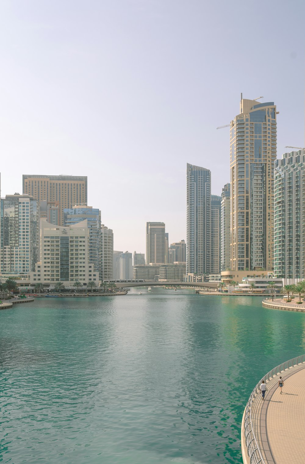 a large body of water surrounded by tall buildings