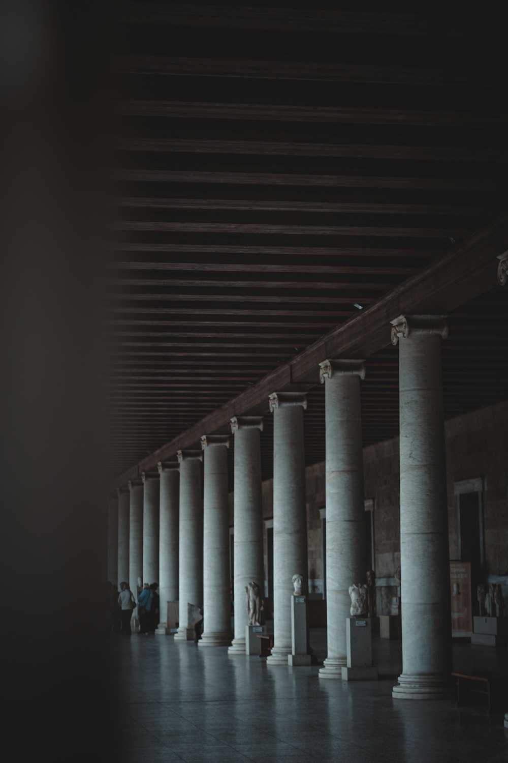 a long row of columns in a building