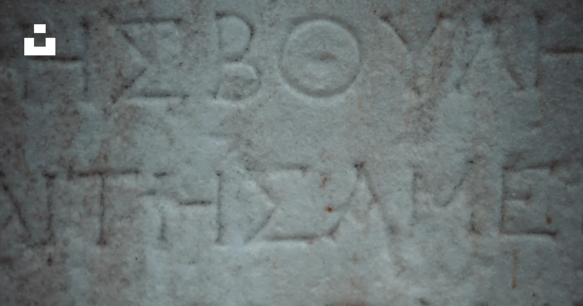 A close up of a stone with writing on it photo – Free Athens Image on ...
