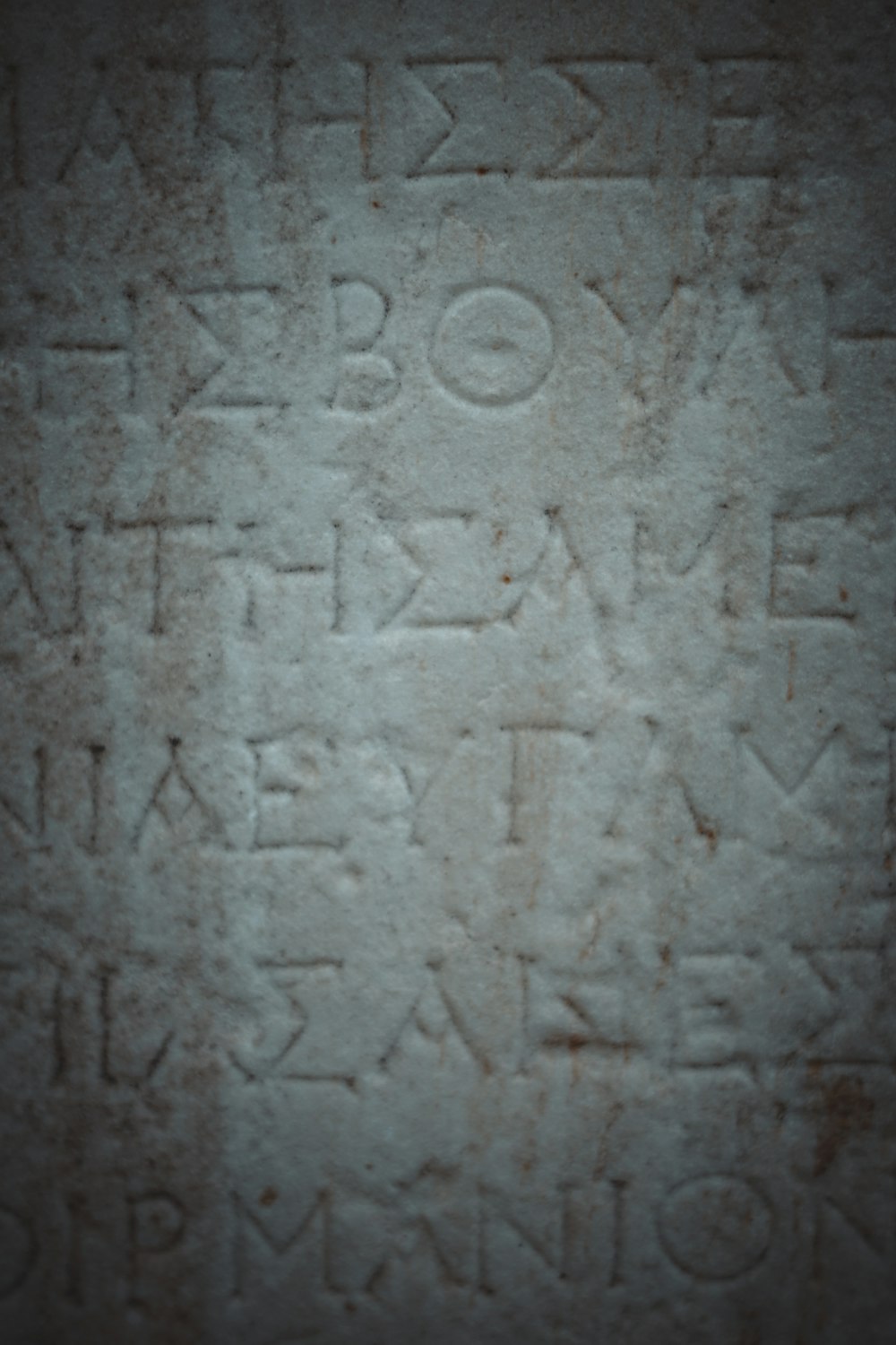 a close up of a stone with writing on it