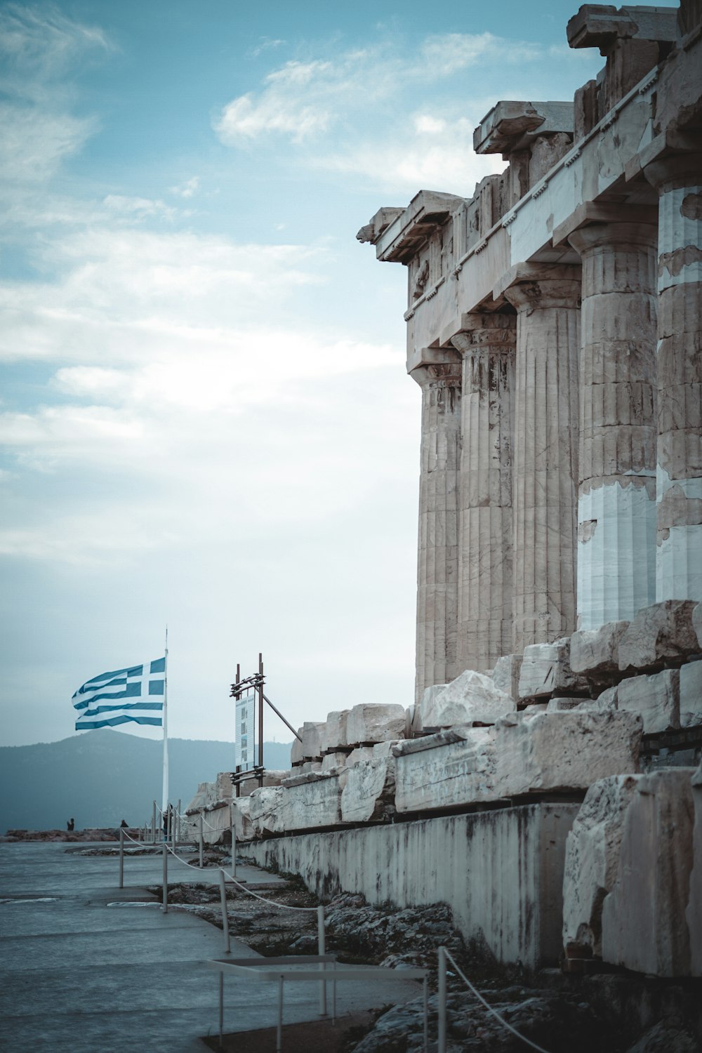 a flag is flying in front of a building