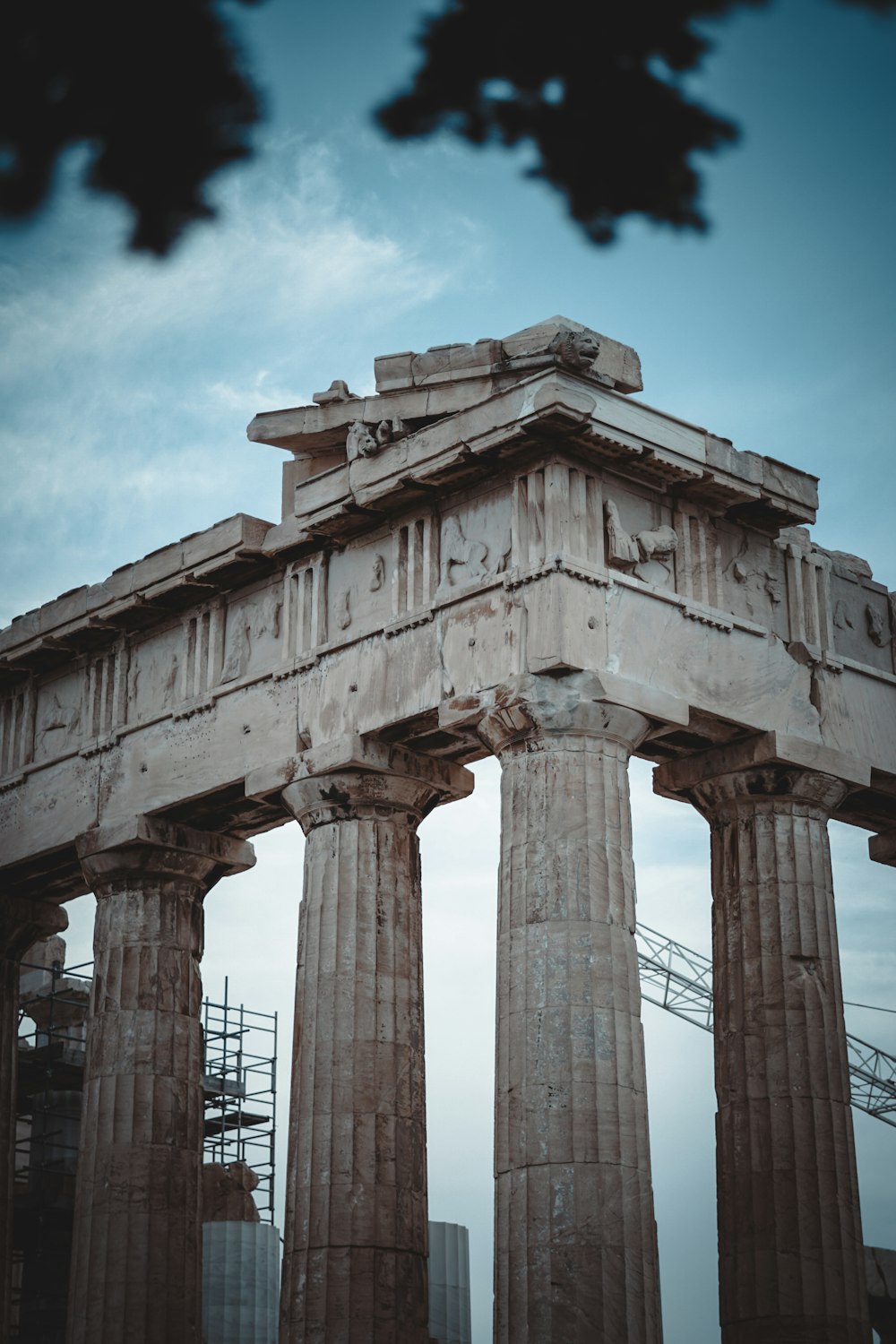 a large stone structure with many pillars