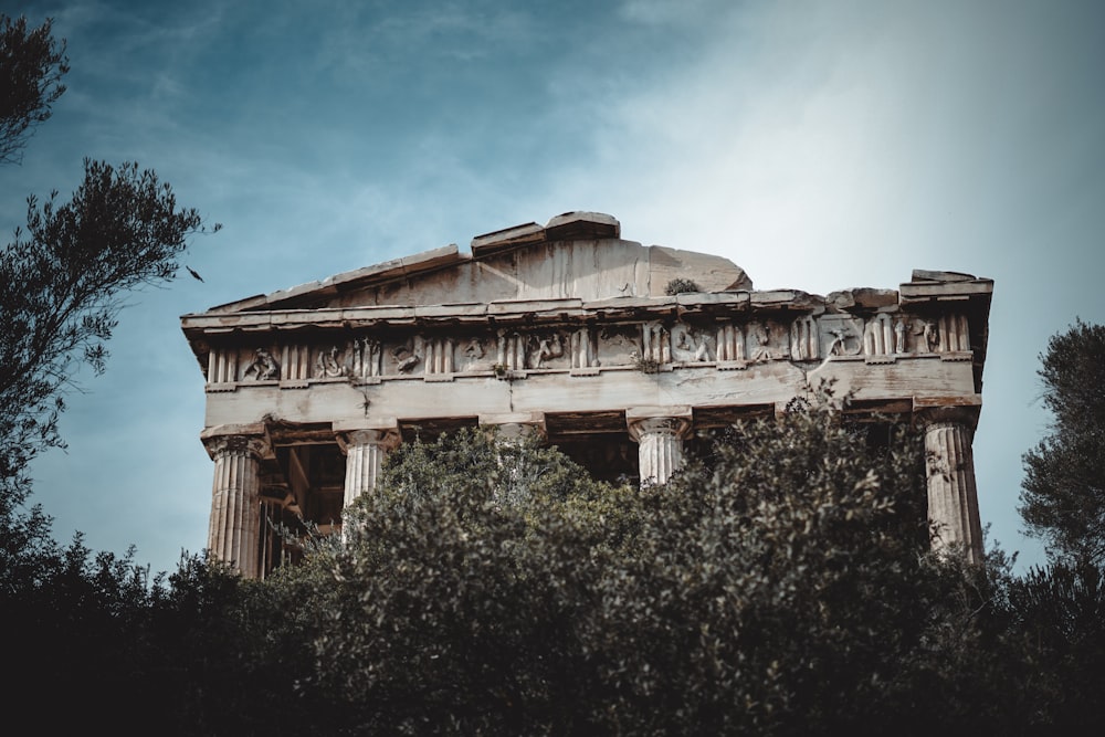 an old building with a lot of carvings on the side of it