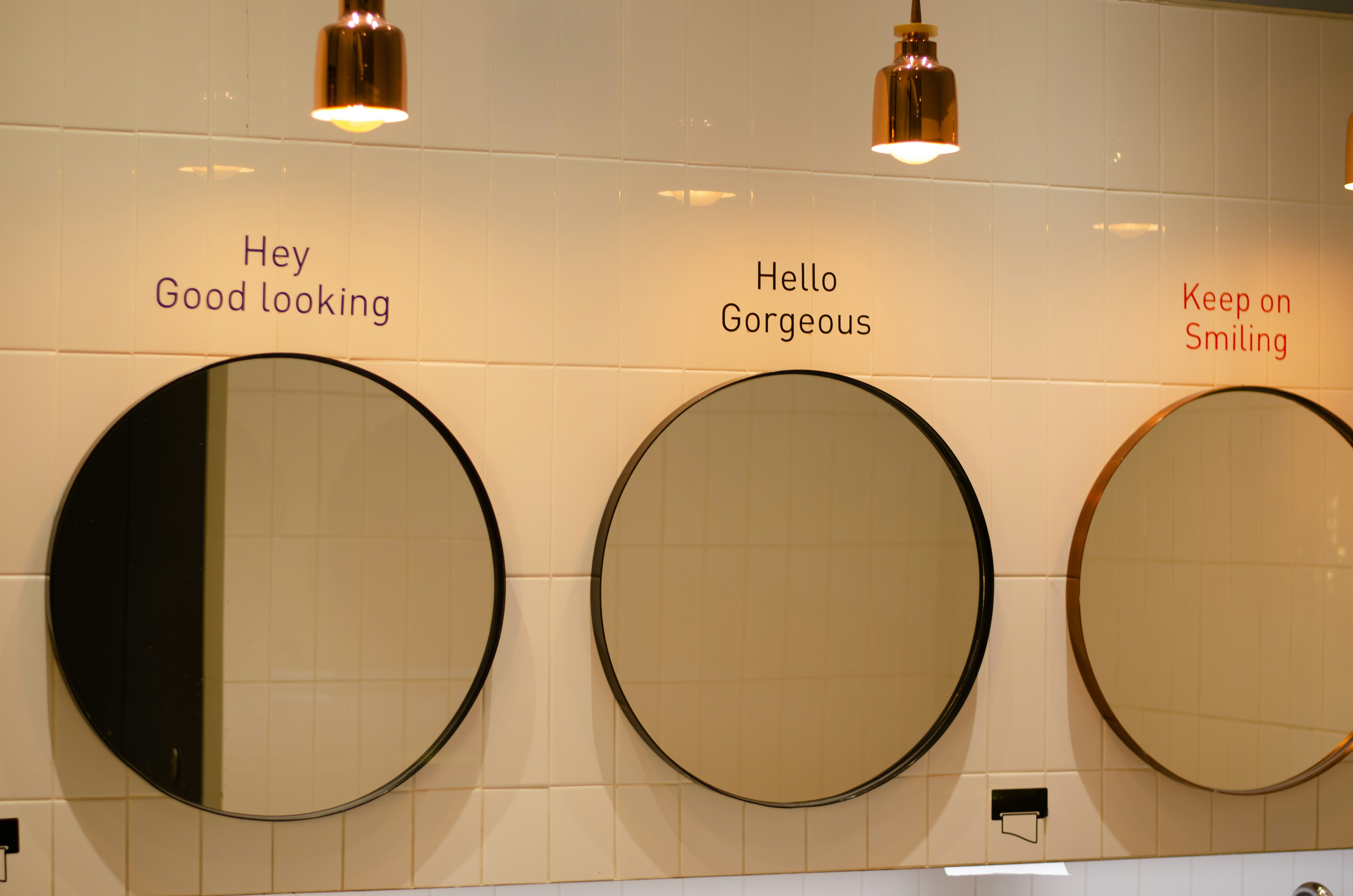 Bathroom with round mirrors