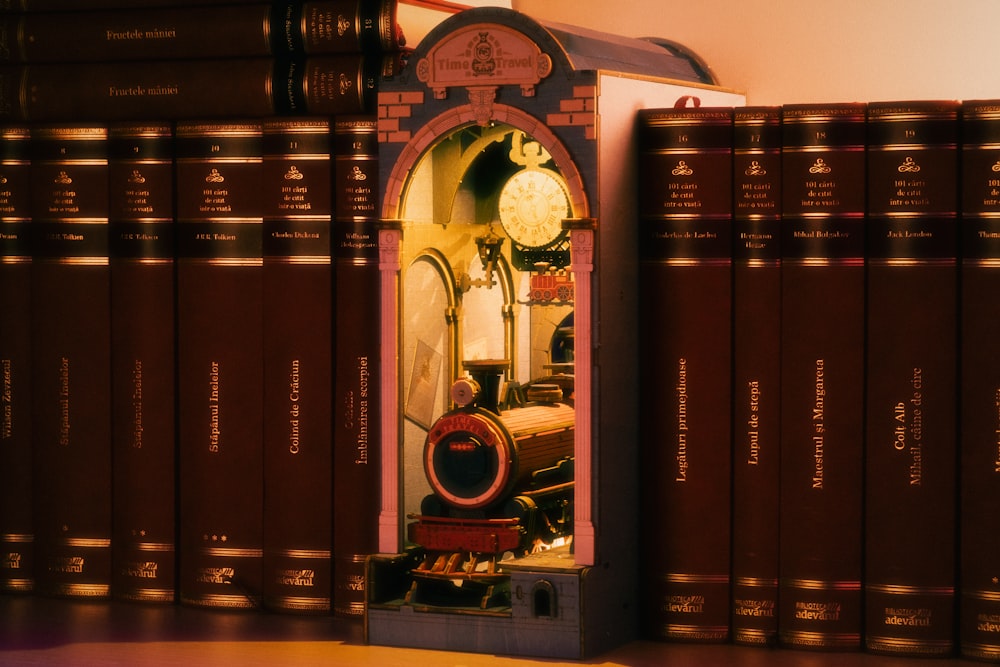 a room filled with lots of books and a clock