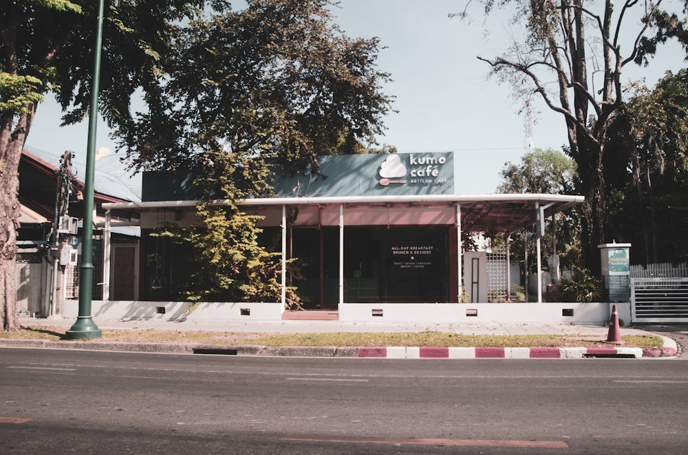 a street corner with a building on the corner