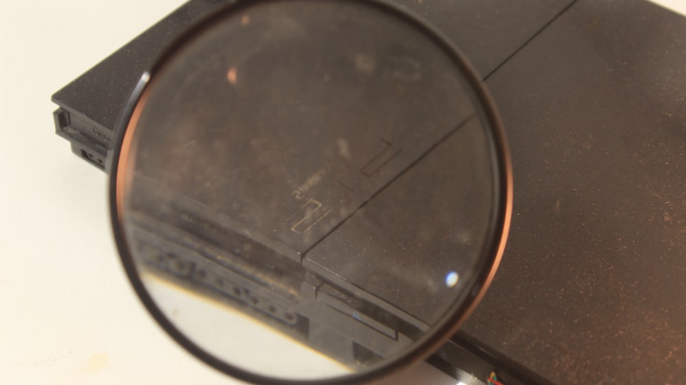 a close up of a magnifying glass on a table