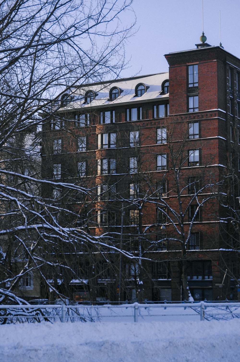 a large building with a clock on the top of it