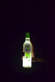 a bottle of alcohol sitting on top of a table