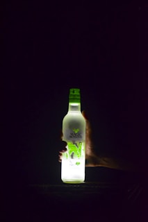 a bottle of alcohol sitting on top of a table