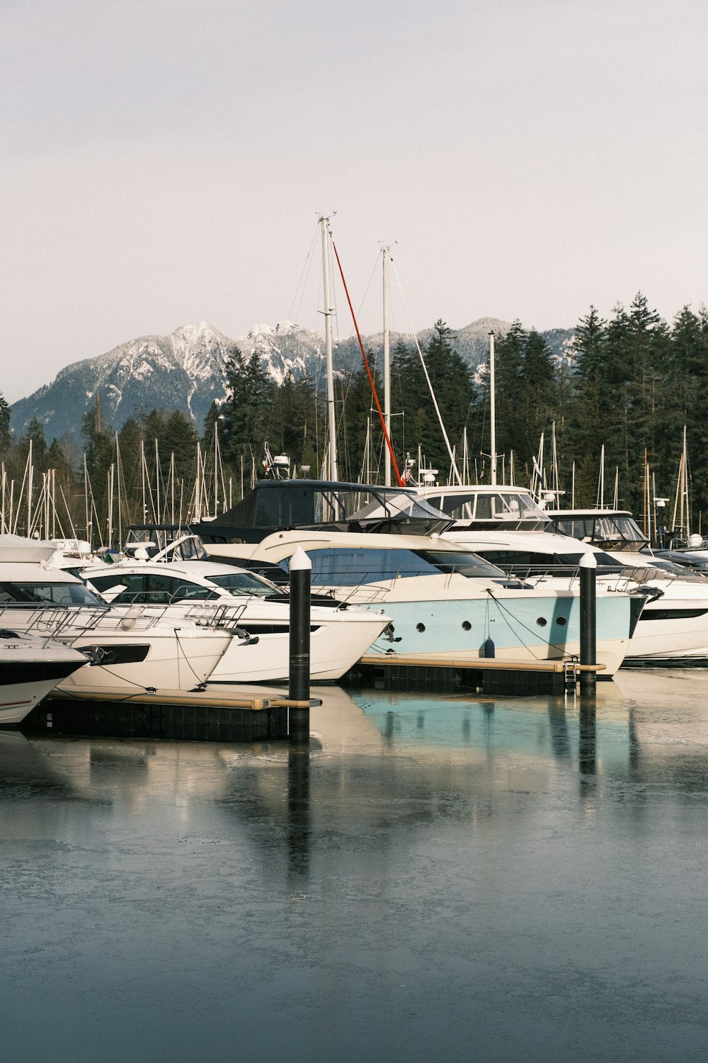 a bunch of boats that are sitting in the water