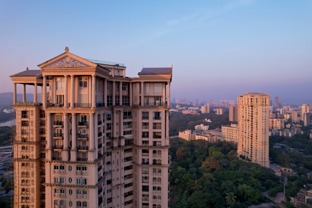 a tall building with balconies on top of it