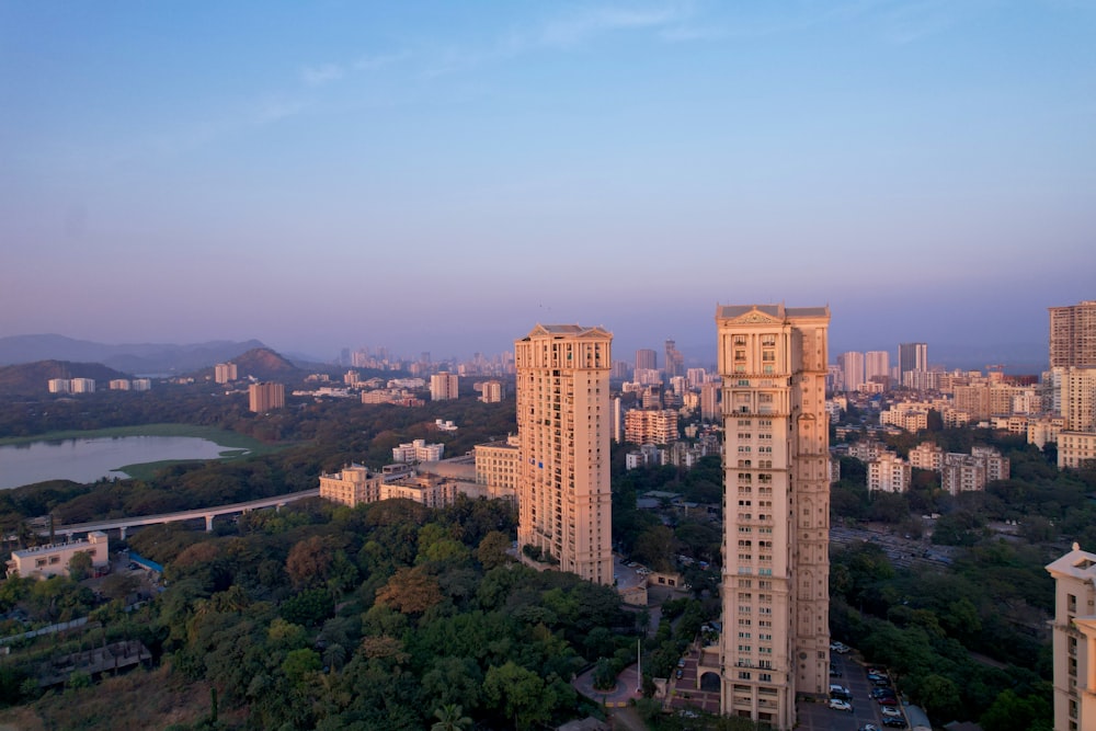 an aerial view of a city with tall buildings