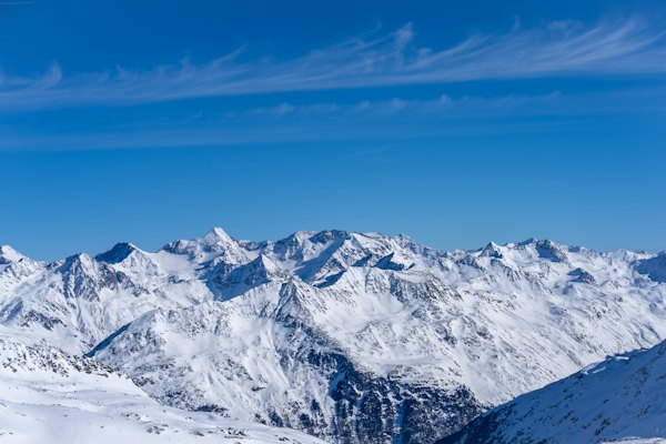 A view of a snowy mountain range from the top of a mountain — Sölden, Austria