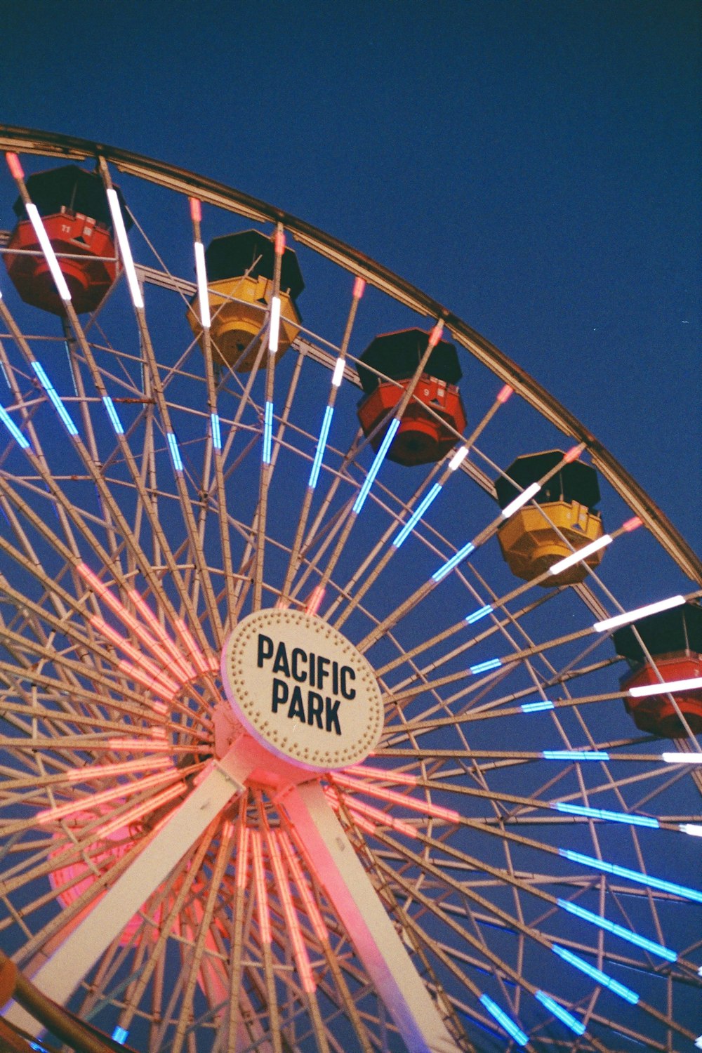 a ferris wheel with a sign that says pacific park