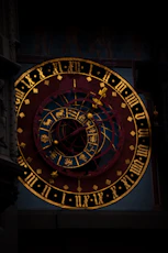 a large clock with roman numerals on it