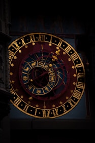 a large clock with roman numerals on it