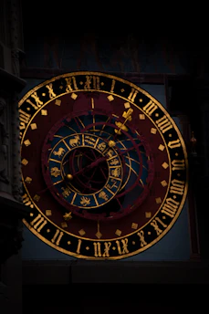 a large clock with roman numerals on it
