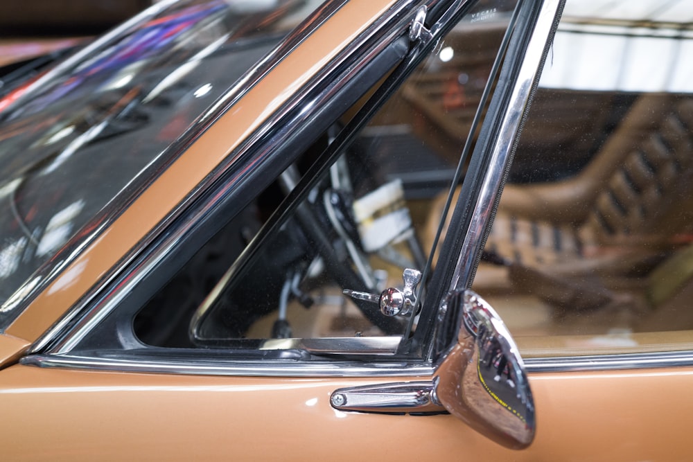 a close up of a car's side view mirror