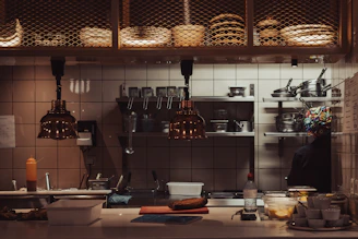 a kitchen filled with lots of pots and pans